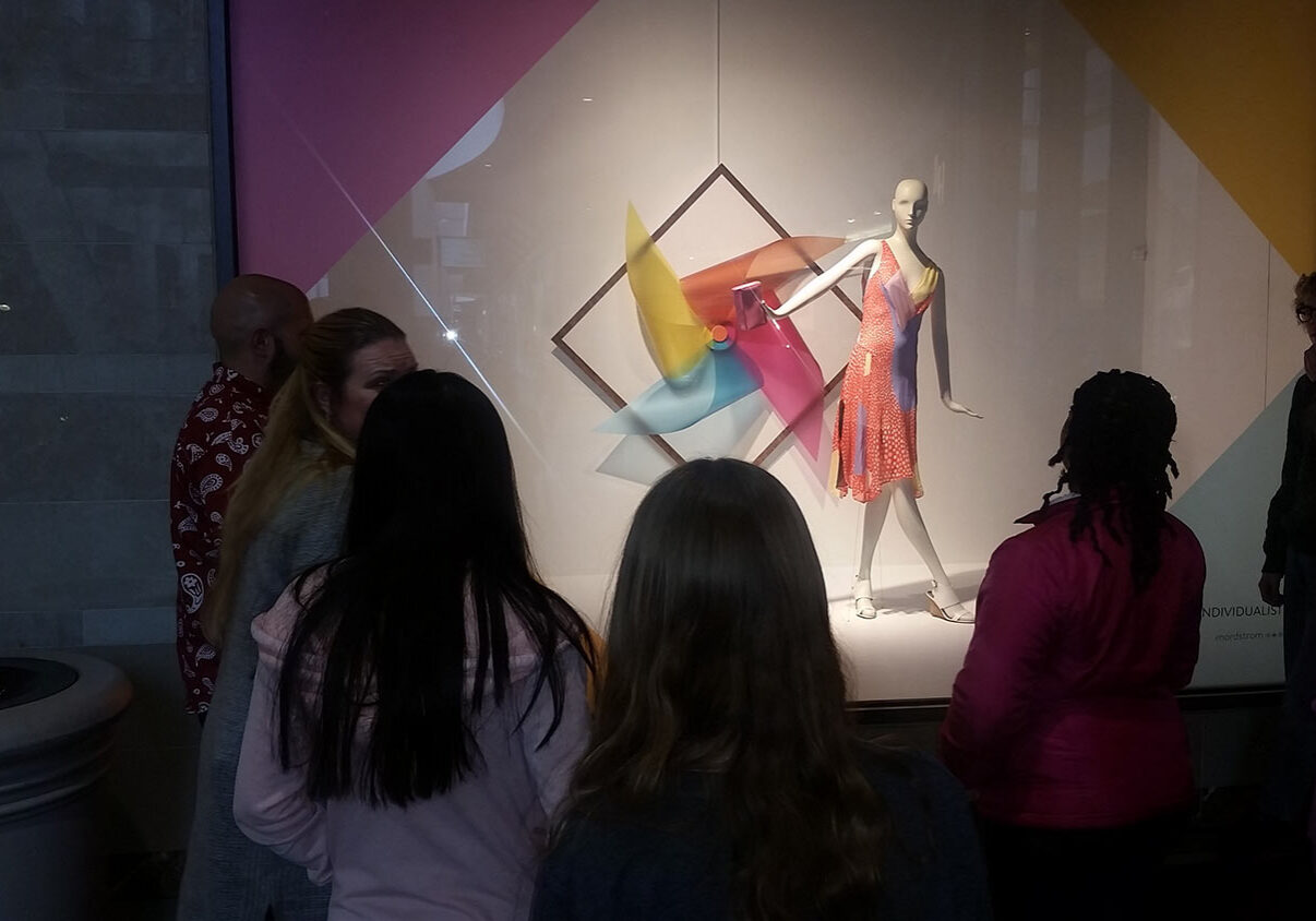Teen Squad members look at a window display at Nordstrom Teen Squad members look at a window display at Nordstrom